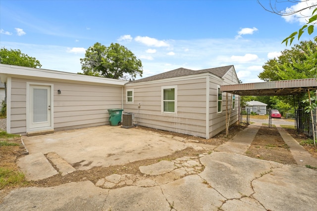 back of property featuring a patio and central AC unit