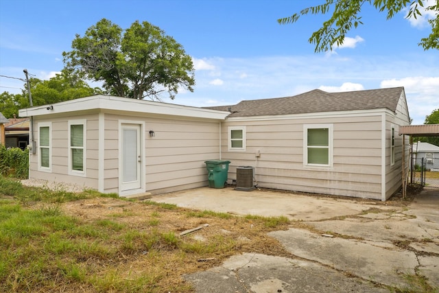 back of house featuring central AC and a patio area