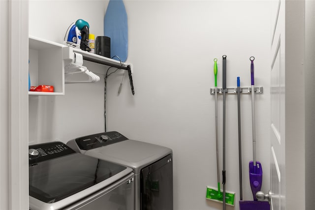 laundry room featuring washing machine and dryer