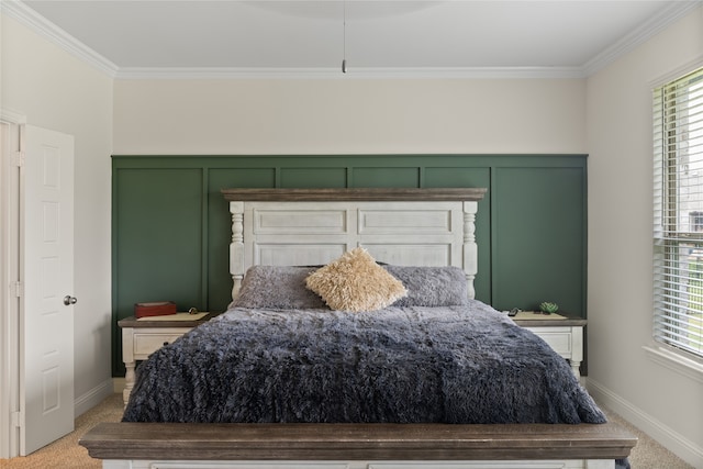 carpeted bedroom with ornamental molding