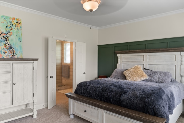 bedroom featuring crown molding, ceiling fan, and light carpet