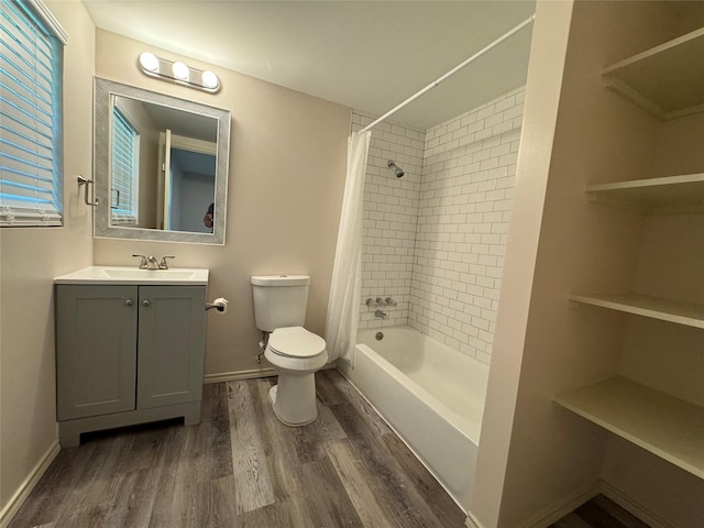 full bathroom with toilet, vanity, shower / bathtub combination with curtain, and hardwood / wood-style floors