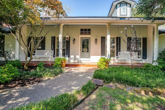 farmhouse with a porch