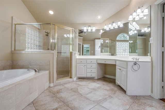 bathroom with plus walk in shower, tile patterned flooring, ceiling fan, and double sink vanity