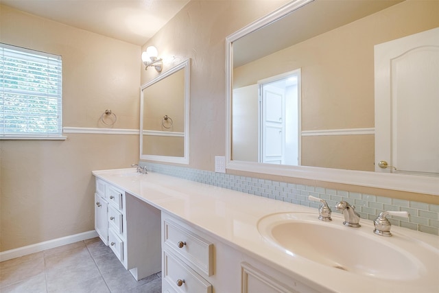 bathroom featuring dual vanity, tile patterned floors, and decorative backsplash