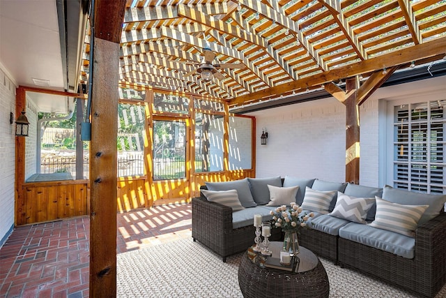 sunroom featuring ceiling fan