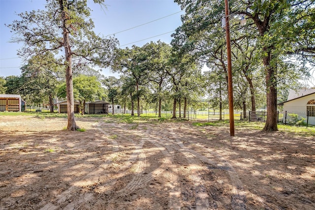 view of yard with an outdoor structure