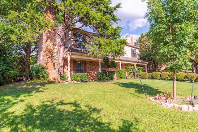 view of front of house with a front lawn