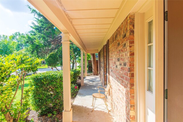 view of patio featuring a porch