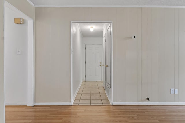 hallway featuring a textured ceiling and light hardwood / wood-style flooring