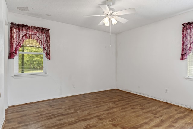 unfurnished room featuring wood-type flooring and ceiling fan