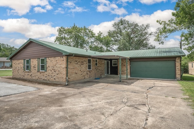 single story home with a garage