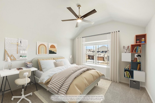 carpeted bedroom with ceiling fan and lofted ceiling