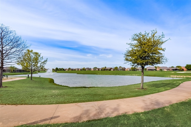 surrounding community featuring a lawn