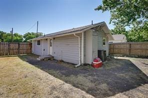 view of outbuilding with a fenced backyard