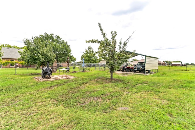 view of yard featuring a carport