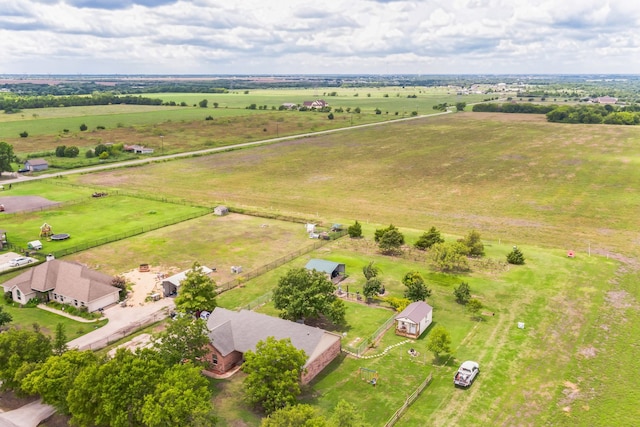 birds eye view of property featuring a rural view