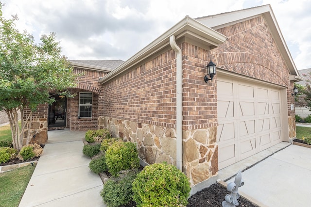 exterior space with a garage