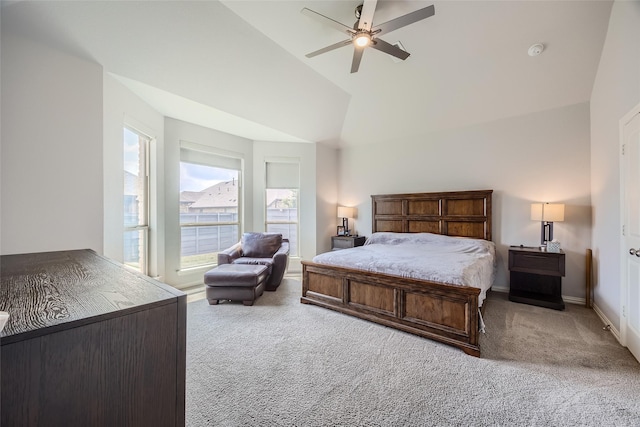 bedroom featuring ceiling fan, lofted ceiling, and carpet