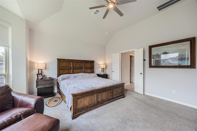 carpeted bedroom featuring lofted ceiling and ceiling fan