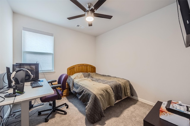 bedroom featuring ceiling fan and light colored carpet