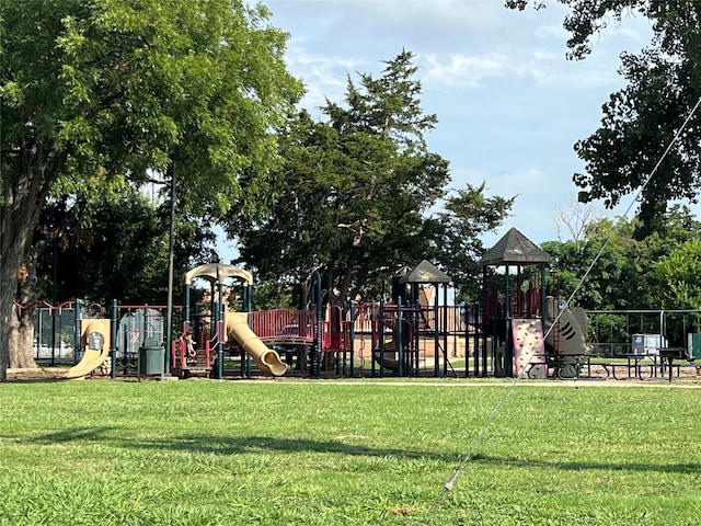 view of play area featuring a lawn