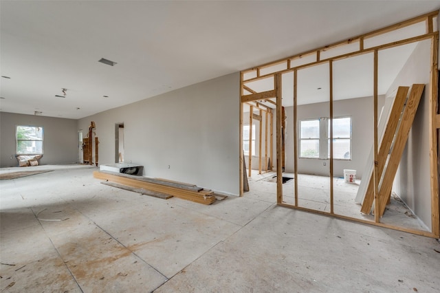 unfurnished room featuring a wealth of natural light