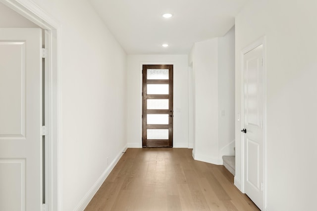 entryway with light hardwood / wood-style flooring