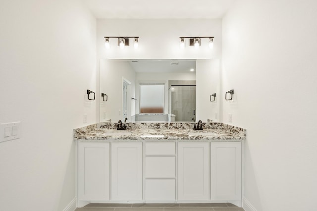 bathroom featuring vanity and walk in shower