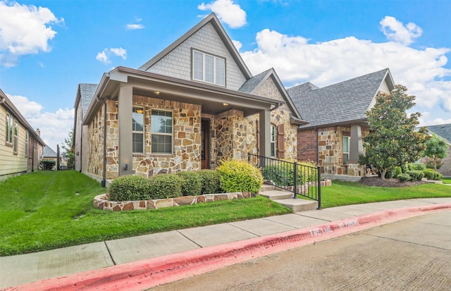 8604 Grassland Dr, Mckinney, TX 75070 - view of front facade featuring stone siding and a front yard