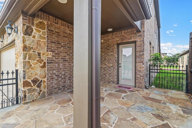 8604 Grassland Dr, Mckinney, TX 75070 - entrance to property featuring brick siding and fence