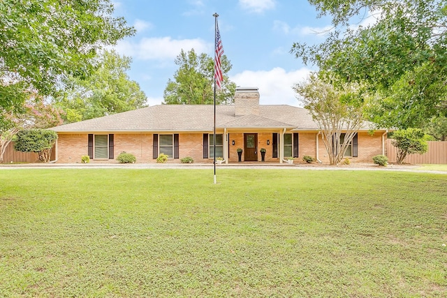 ranch-style home with a front yard