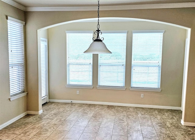 14229 Alis Ln, Frisco, TX 75035 - unfurnished dining area featuring plenty of natural light, arched walkways, baseboards, and ornamental molding