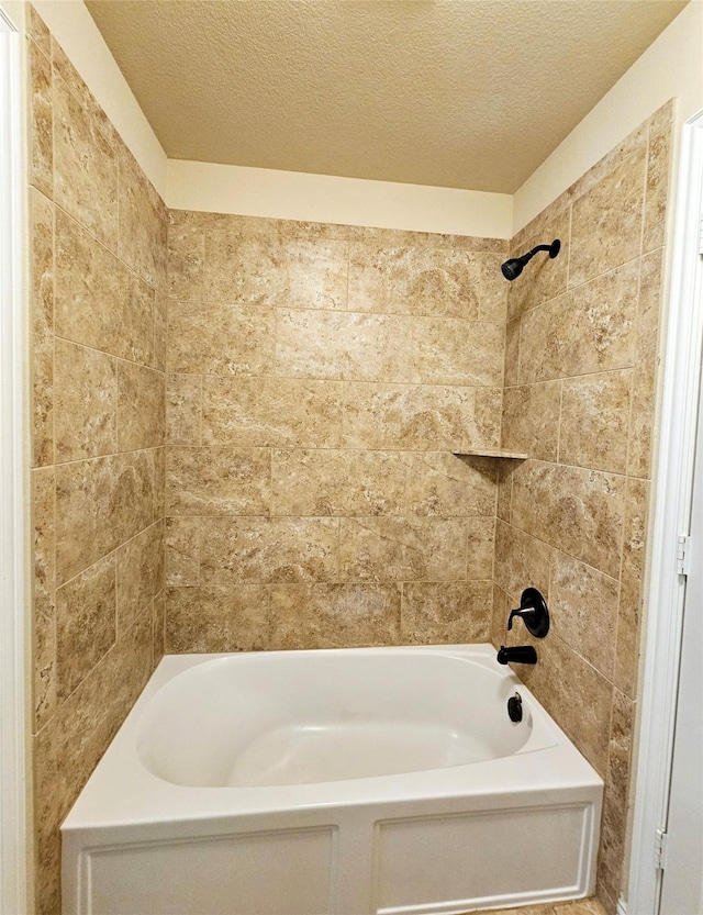 14229 Alis Ln, Frisco, TX 75035 - bathroom with  shower combination and a textured ceiling