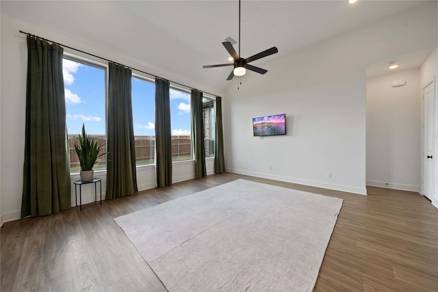 interior space with hardwood / wood-style floors and ceiling fan