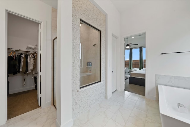 bathroom featuring tile patterned flooring, independent shower and bath, and ceiling fan