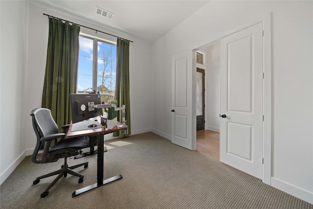 home office featuring light colored carpet