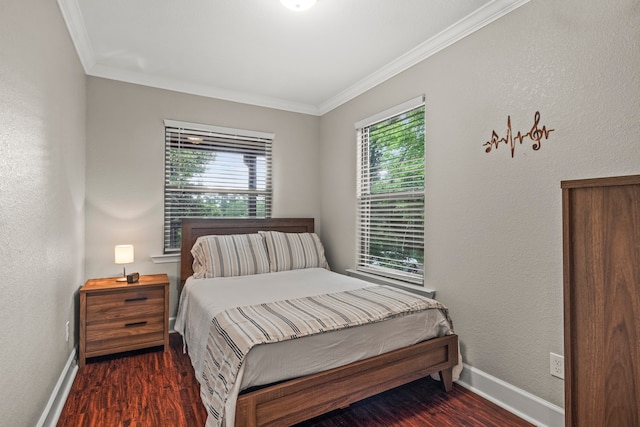 bedroom featuring dark wood-type flooring and crown molding