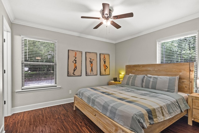 bedroom with dark wood-type flooring, ornamental molding, and ceiling fan