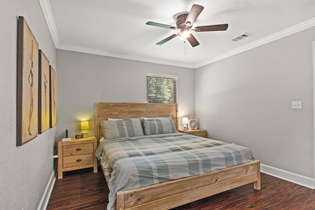 bedroom featuring dark hardwood / wood-style flooring, crown molding, and ceiling fan