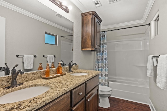 full bathroom with shower / tub combo with curtain, wood-type flooring, vanity, toilet, and crown molding