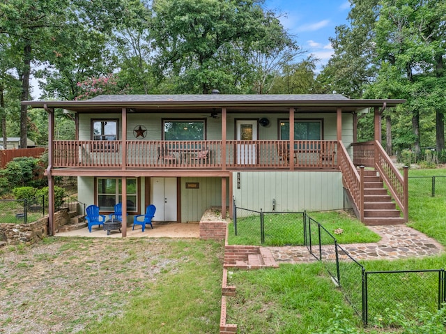 exterior space with a patio and a front yard