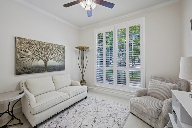 carpeted living room with crown molding and ceiling fan