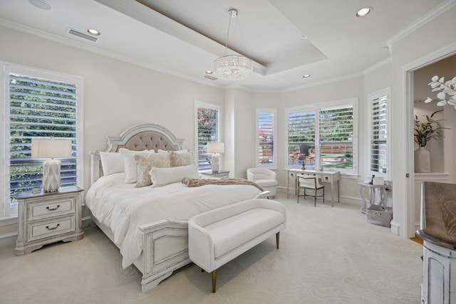 carpeted bedroom with a notable chandelier, crown molding, and a raised ceiling