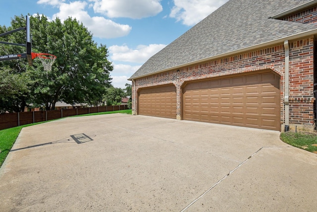 view of side of property with a garage