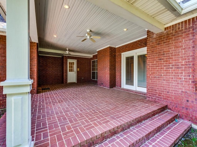 view of patio featuring a ceiling fan