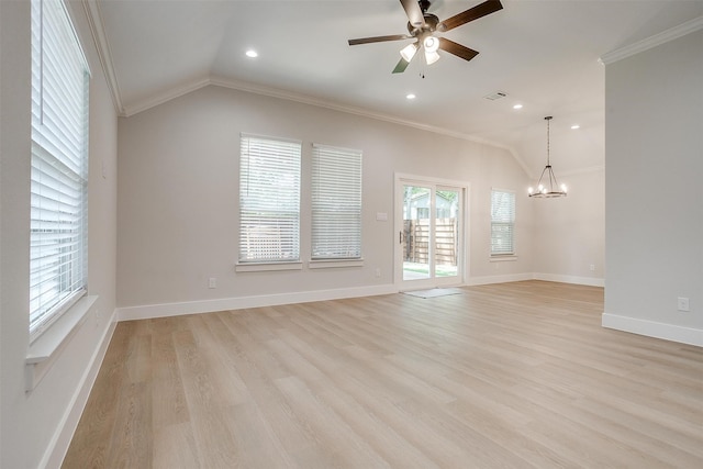 unfurnished living room with ornamental molding, light hardwood / wood-style flooring, ceiling fan with notable chandelier, and vaulted ceiling