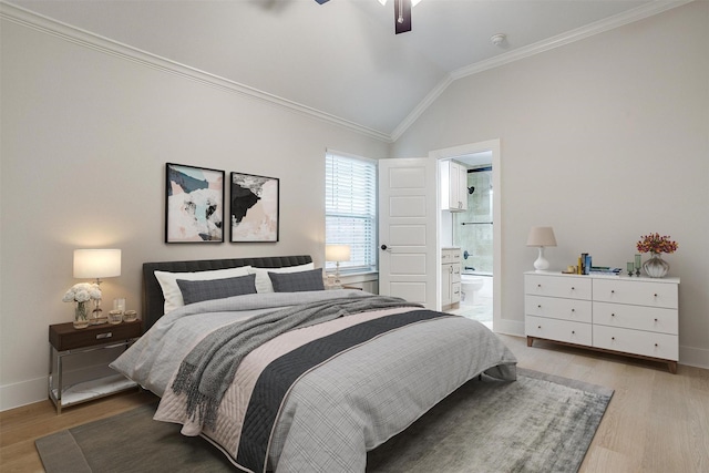 bedroom featuring lofted ceiling, connected bathroom, crown molding, and light hardwood / wood-style floors