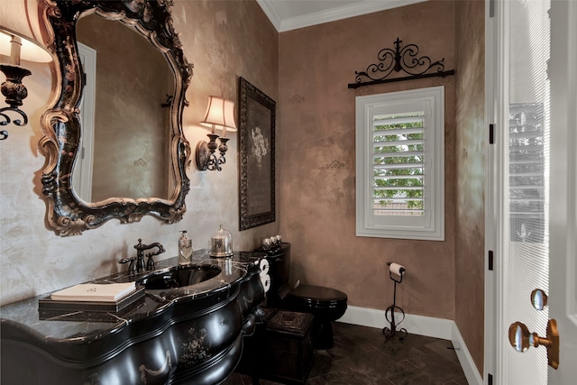 bathroom with sink, ornamental molding, and tile patterned floors