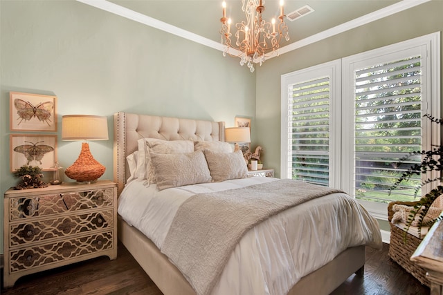 bedroom with a chandelier, crown molding, and dark wood-type flooring